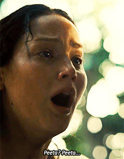 solo-por-un-dia:  peetamellarkthebaker: I leave my weapons in the dirt as I fling myself at him. “Peeta?” I say softly. I brush the damp blond strands of hair back from his forehead, find the pulse drumming against my fingers at his neck.  His lashes