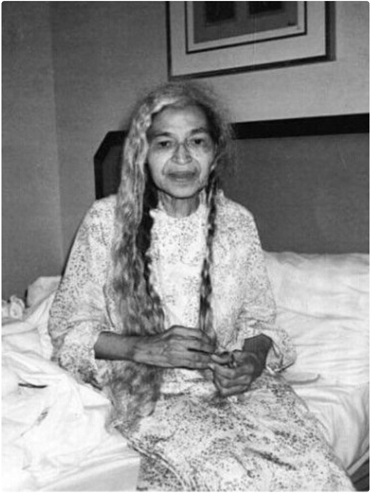 bellygangstaboo:Never saw a pic of Mrs. Parks with her hair down before. She looks