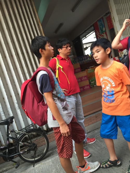 Red backpack with nice polka dot shorts.