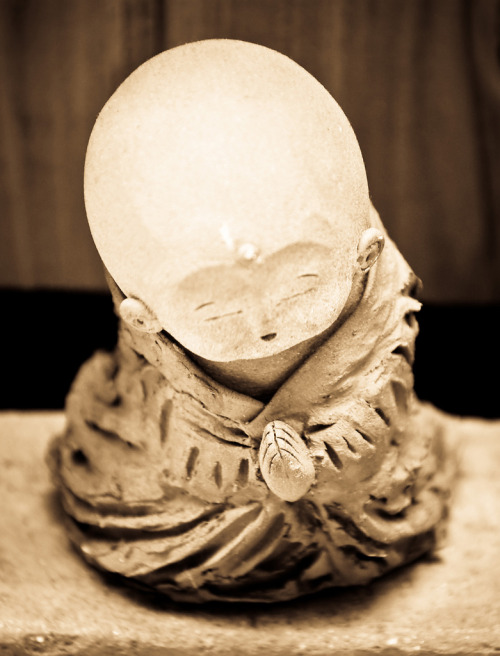 An Jizo found in a temple on Teramachi street, Kyoto, Japan.  Photography by Stephane Barbery on Fli