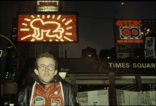 twixnmix: Keith Haring’s in front the Spectacolor Billboard showcasing his signature Radiant Baby in