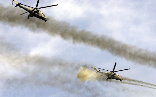 inthemilitary:Two Mil Mi 24 Hind attack helicopters firing rockets Source: https://imgur.com/dr5qiHC