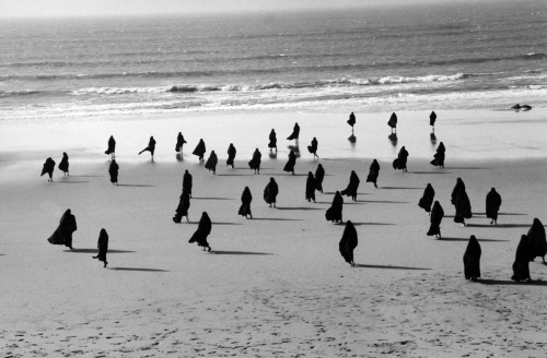 Rapture Series by Shirin Neshat, 1999.  Rapture consists of two projections shown on opposing galler