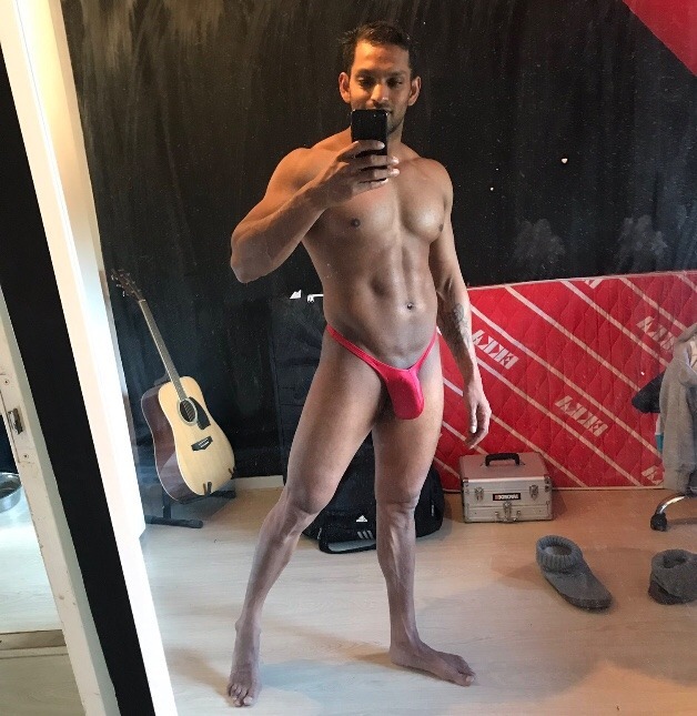 desibeefcake:  Desi beefcake in a sexy red thong, asking to be pounded.