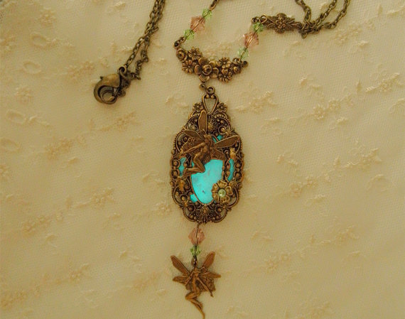 wickedclothes:    Fairies’ Dance NecklaceThe dance of the fairies happens on your