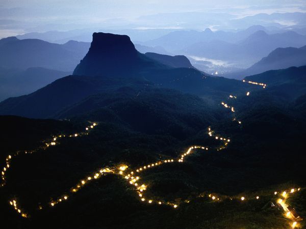 commovente:  Sri Lanka, Photograph by Greg Elms A long line of lights illuminates