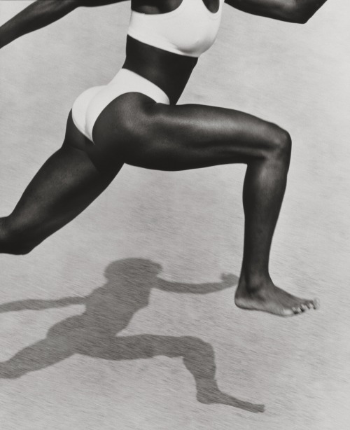 Herb Ritts, best known for his fashion photography, here focuses on the muscular and elegant legs of