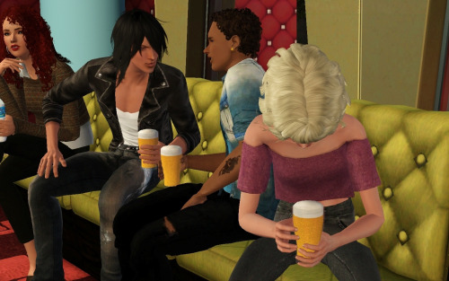 After their game, which Isaac wins effortlessly, they sit down with their drinks in the karaoke area