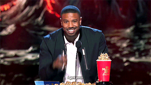 thatgeeklover: marvelheroes: Michael B. Jordan accepts the award onstage at the 2018 MTV Movie And T