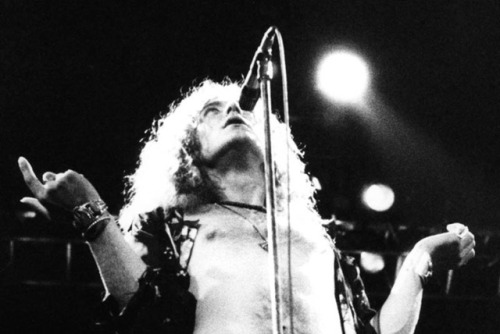 soundsof71:  The Golden God in black & white: Robert Plant singing “Stairway to Heaven” at Earls Court, 1975, by Mick Gold