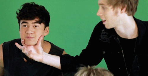 calumsthood: Calum has a squishy face // When you’re the clingy band member - Luke Hemmings