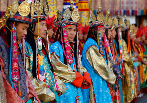 sartorialadventure:Bhutanese dancers in traditional attire, coronation of the Fifth Dragon King, Jig