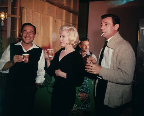 Gene Kelly with Marilyn Monroe and Yves Montand at the 20th Century-Fox studios to do a cameo bit on