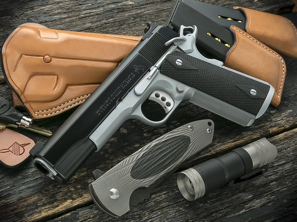gunsknivesgear:  Gun, Knife, Light.The holy trinity of everyday carry.