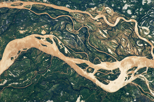    South America’s second largest river, the Paraná River (and its tributaries) is seen here in this astronaut photo acquired on April 9, 2011, revealing an 18-mile-across (29 kilometers) expanse of the river downstream from Goya, Argentina. - NASA