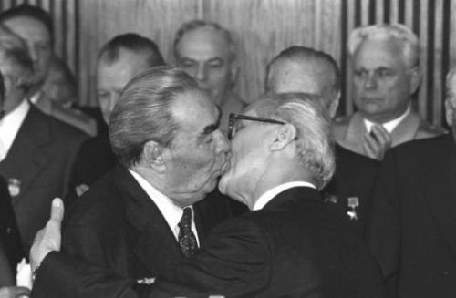 Soviet Premier Leonid Brezhnev smooches East German First Secretary Erich Honecker, October 7th, 197