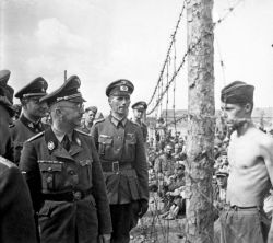 fionna-andcake:       frankanthonyway:  clingy:  mercilesss:  The prisoner defiantly stares down Heinrich Himmler, Hitler’s right-hand-man, who was responsible for the Holocaust. Greasley’s confrontation with Himmler took place during an inspection