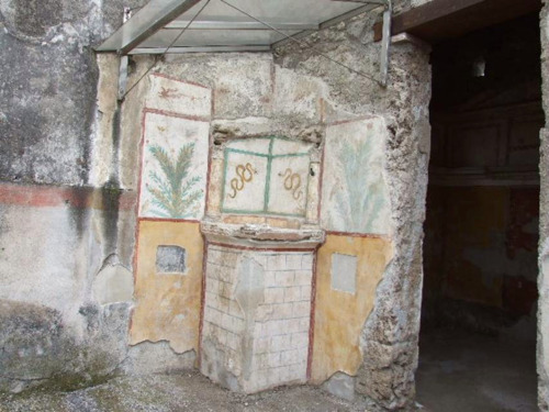 Lararium from Pompeii; The sacred corner of the houses in ancient Rome.