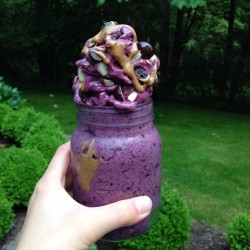 portableairport:  fitwithoutfat:  4 frozen bananas + frozen blueberries ~ blended ~ topped with almonds, almond butter, and chocolate covered blueberries. You don’t know how good this was 😍  i don’t get this cram everything into a mason jar aesthetic.