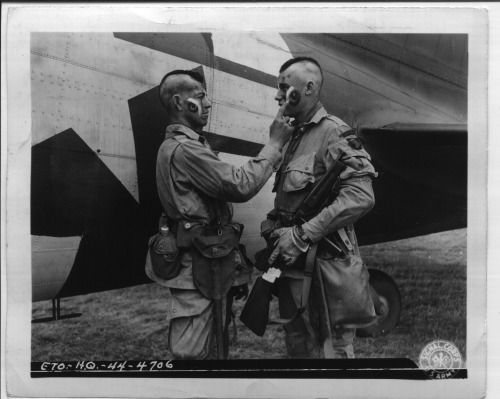 todaysdocument:#DDAY70 D-Day -1:Pvt. Clarence C. Ware,…San Pedro, Calif., gives a last second touch 