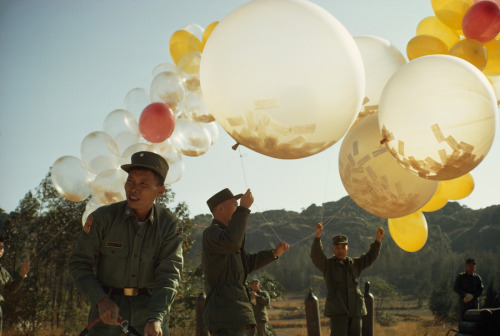 To spread political views, soldiers release balloons holding leaflets in Taiwan, January 1969.Photog
