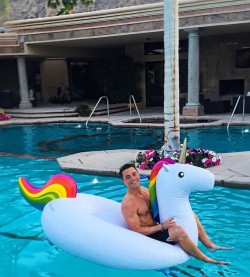 celebrityboyfriend:  Colton Haynes rides a rainbow unicorn
