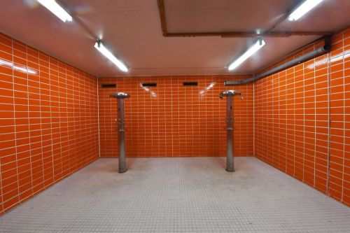 Men’s showers at the Munich Olympic Stadium, Germany.