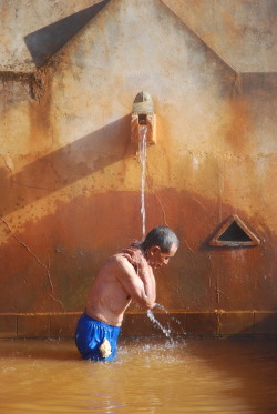   Nepali Tamang people at a hot spring, via