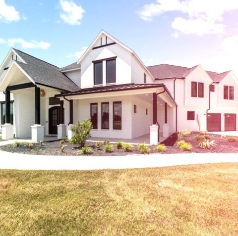 Painted Brick Dallas
Large cottage white two-story painted brick exterior home photo with a shingle roof