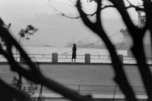 Sometimes Yoko goes down to the Port in Yokohama to watch the Ships sail off to the Places she only 