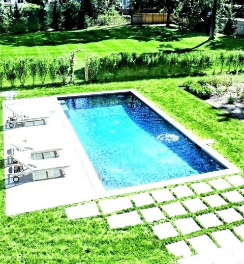 Farmhouse Pool BridgeportIdea For A Medium-sized Farmhouse Backyard Lap Pool With Rectangular Tiles.