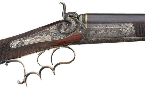 An engraved and decorated single shot sporting rifle crafted by Johann Springer of Vienna, mid 19th 