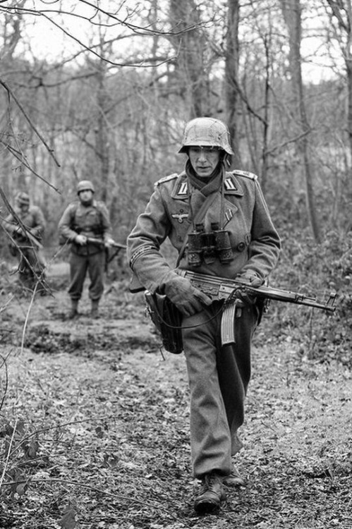 itshistory:German soldier carrying the Sturmgewehr 44 during the East Prussian Offensive. February 1
