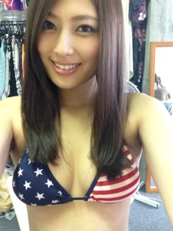 orientalslavegirl: dumb-asians:  That tight yellow body is property of the USA  Pretty asian girl proudly wears the flag of her race’s conquerors. Smart asian girls understand that acknowledging the victors and keeping their bodies lean and trim for