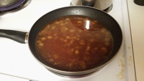 Juices leftover from a pot roast, cooking further in a frying pat.