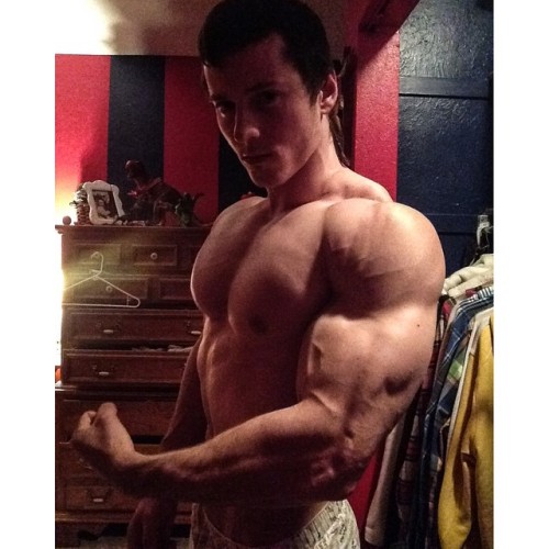 beautifulyoungmuscle:The stunning flexed biceps of Zach Zeiler. Piled high with muscle, studded with veins, rippling with mass and power, they’re erotic totems of beautiful young muscle.