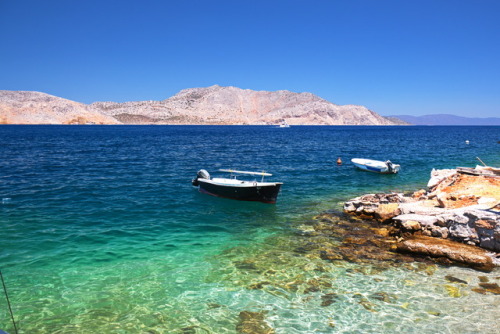 Transparent. Durchsichtig.Boats on Symi Island, July 2017.