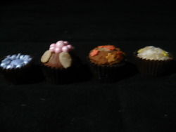 emeraldalpaca:   I made four homestuck pralines :D John Egbert is made of marzipan and some really pretty blue sugar stars, pearls and a big heart. I think he looks nice haha Rose Lalonde on the other hand is filled with nougat, sugar stars and has a