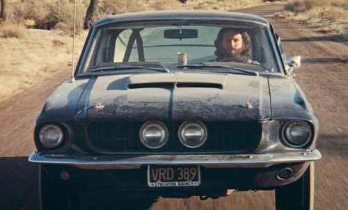 the-eternal-moonshine:Jim Morrison in his Ford Mustang