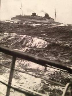 raurrie: Europa in heavy seas. Taken from the deck of her sister Bremen as they pass in Mid-Atlantic.