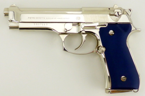fmj556x45:  Beretta 92F 9mm Para caliber pistol. Customized Italian gun with bright nickel finish and blue Aluma grips.