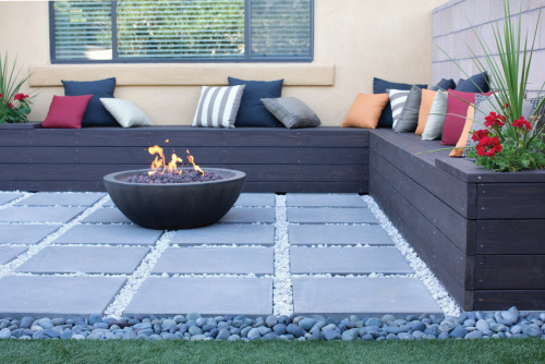 No better way to ward off a chilly evening than a built-in bench around a cozy fire pit.
Want to make a similar bench at home? Get the instructions.