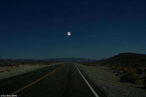 unexplained-events:  Former NASA art director Ron Miller created images of what the night sky would look like if the moon was replaced by the other planets in the solar system. 1. Moon ( Original photo taken over Death Valley, California.)2. Neptune3.