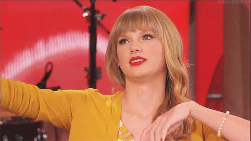 taylorswiftperf:sawalightinyou:taylorswift imitating her cat Meredith.or me