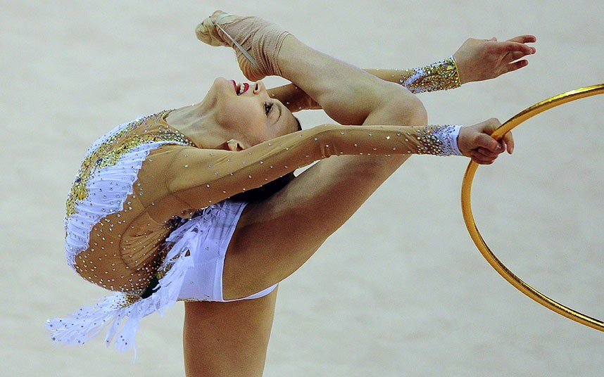 Debrecen, Hungary
Bronze medalist Russia’s Alexandra Soldatova performs her exercise with hoop at the individual final of the Rhythmic Gymnastics World Cup (via Telegraph)