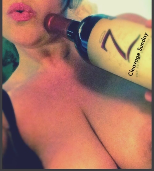 curiouswinekitten2:  curiouswinekitten2:  Cleavage Sunday tomorrow!   Tonight I’m enjoying my CS red Zinfandel.  Lol.  Send me your cleavage.   Sunday is always a good time!  Hahaha!  I forgot about this one. The wine bottle 😂😂😂