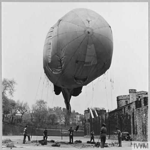 Mrs S. Sloan-Colt, Head of the American Red Cross in Britain, visitsballoon sites operated by the WA