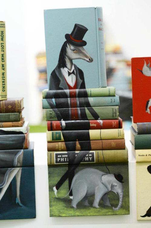 asylum-art:  Painted Book Sculptures byMike Stilkey, “Full of Smiles and Soft Attentions” LA-based artist Mike Stilkey creates whimsical painted sculptures out of stacked books. Mike has always been attracted to painting and drawing not only on vintage