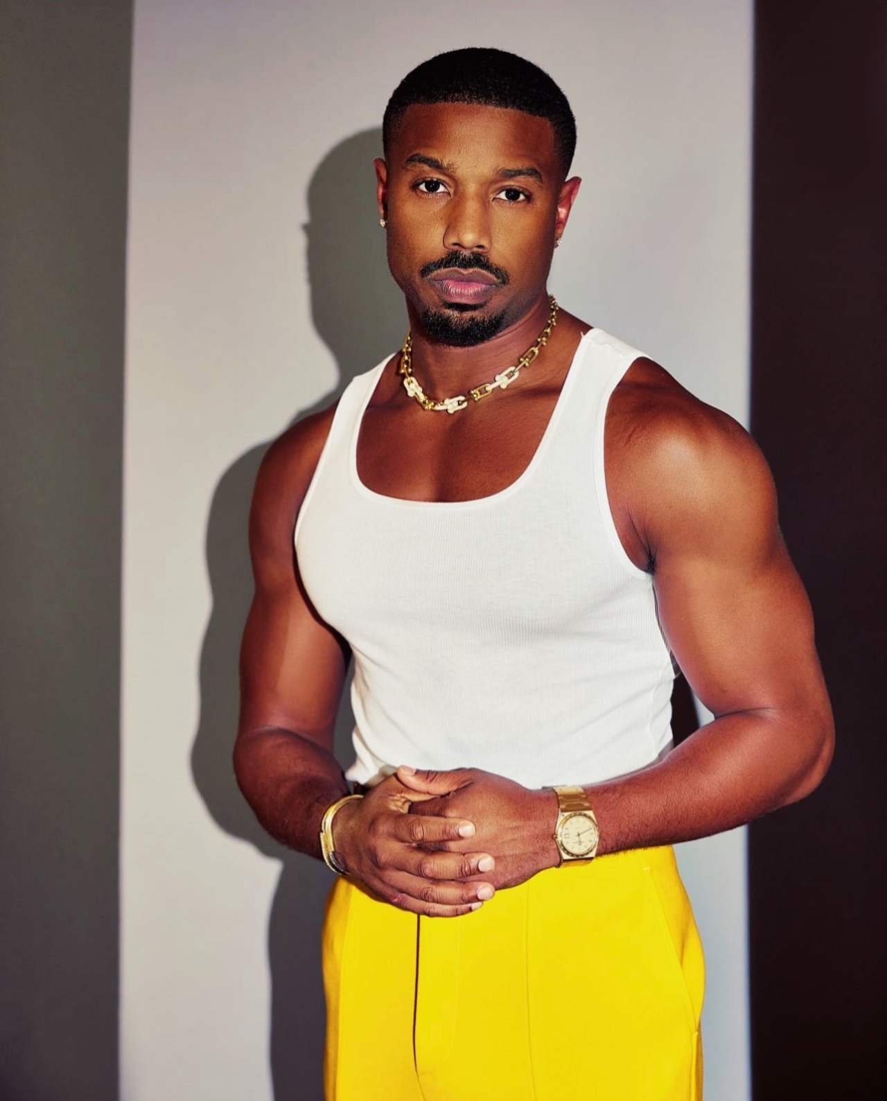 Michael B. Jordan Shines in Yellow Louis Vuitton for 'Black Panther' – WWD