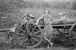 federer7:  Farm girl leaning on wagon, near